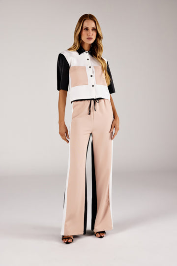 Camisa color block off white preta manga contrastante look frontal Onça Preta