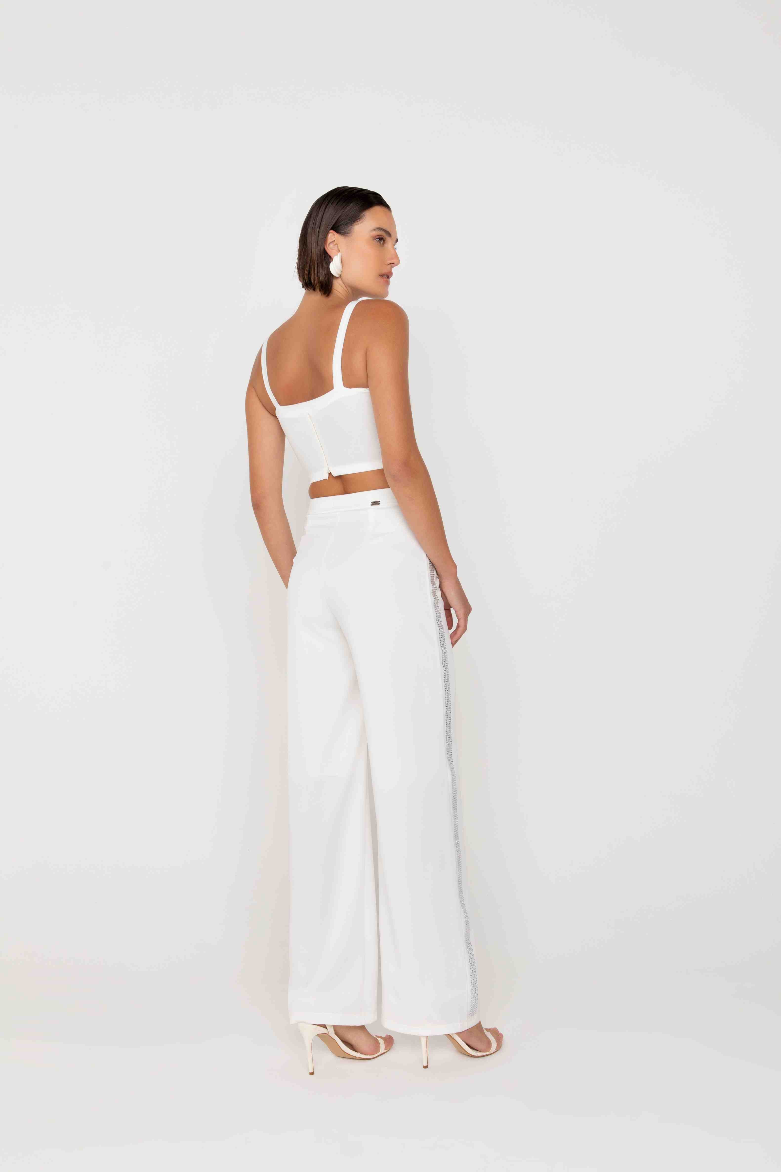 CALCA RETA DETALHE LATERAL STRASS ONCA PRETA