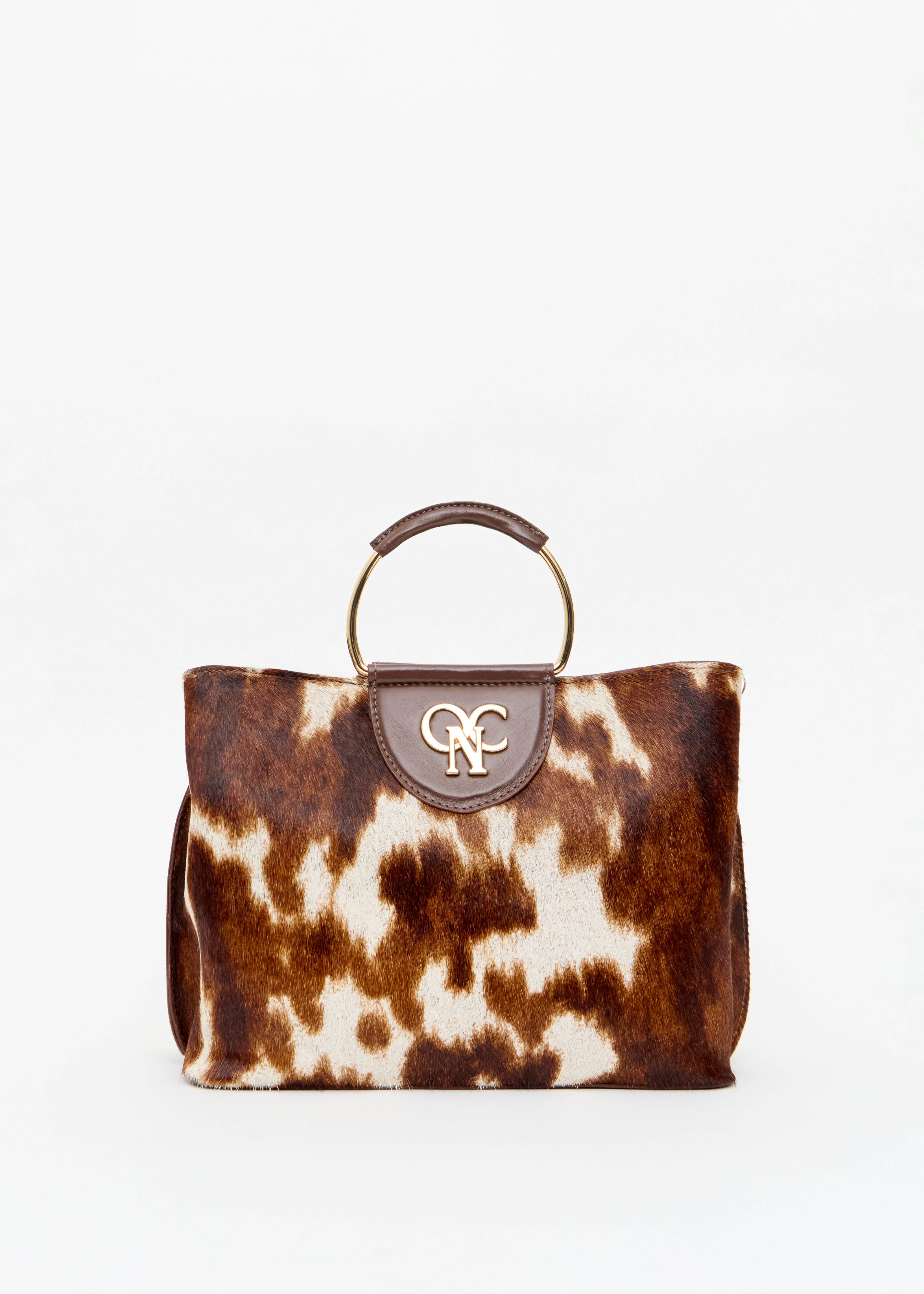 Bolsa feminina pelo animal print alca aro dourado look festa Onça Preta