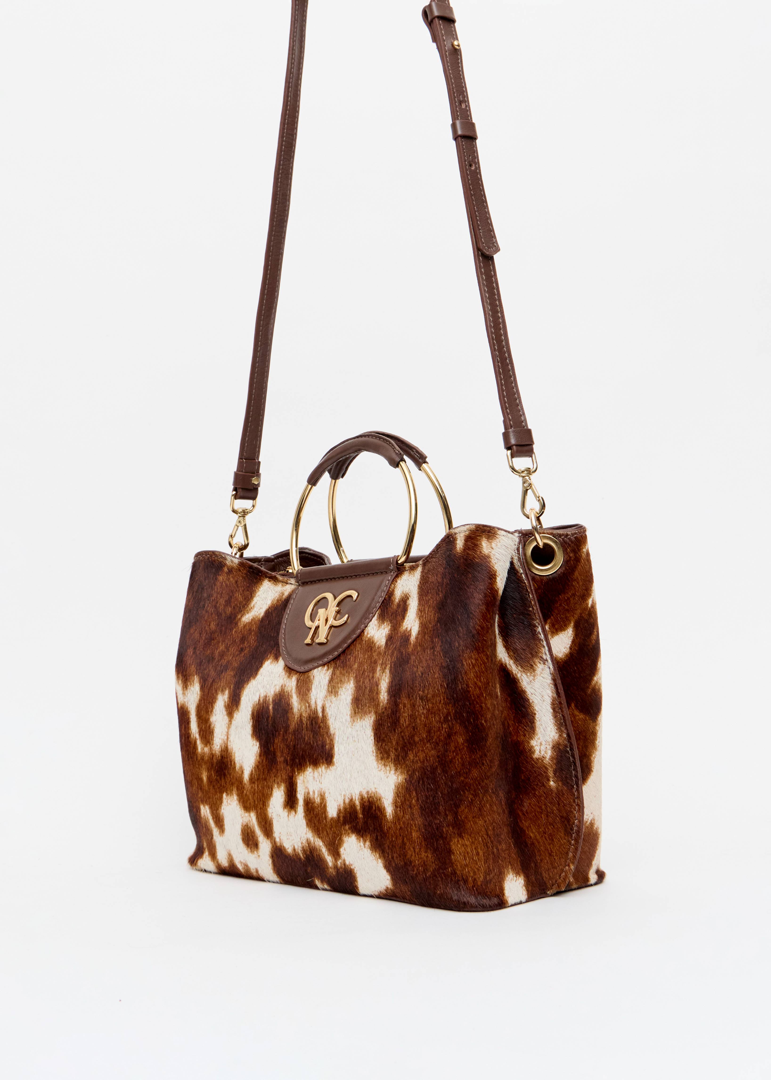 Bolsa feminina pelo animal print marrom monograma OP couro Onça Preta